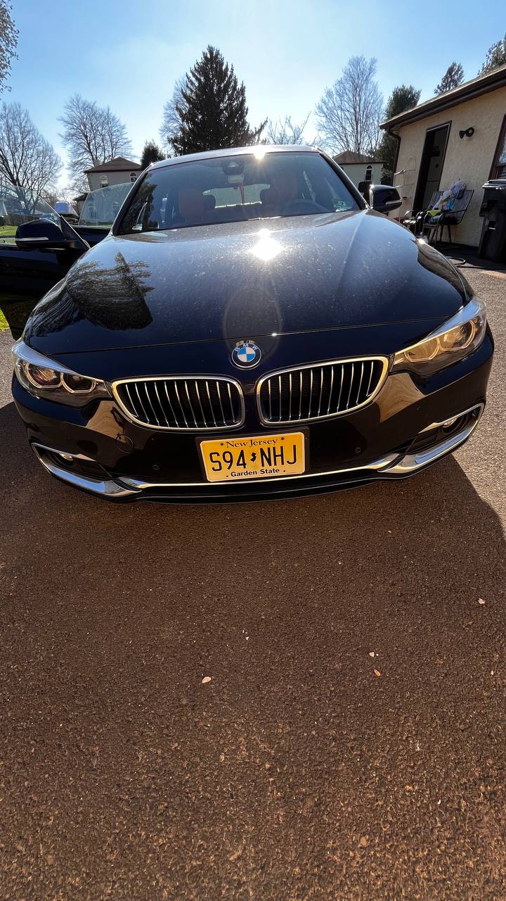 express auto detail in bucks county after exterior detail on BMW sedan using mobile detailing service